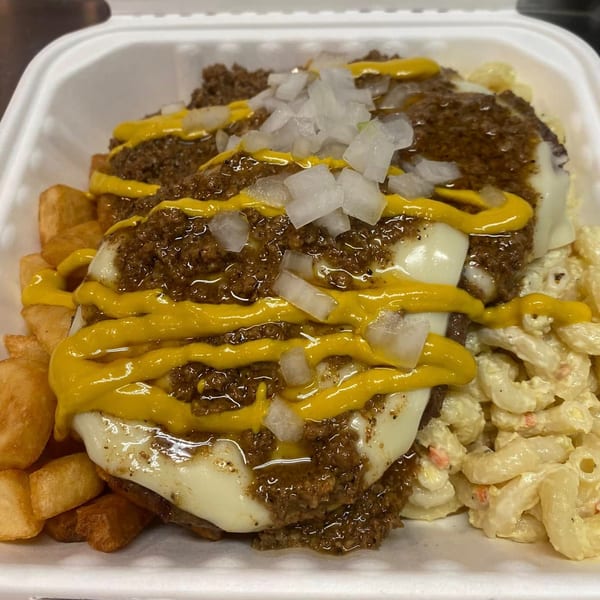 Lina's garbage plate with macaroni salad, home fries, cheeseburger patties, chili, mustard, and onions.